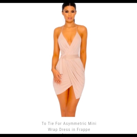 Brand new never worn size 0 wrap dress. - Picture 1 of 3